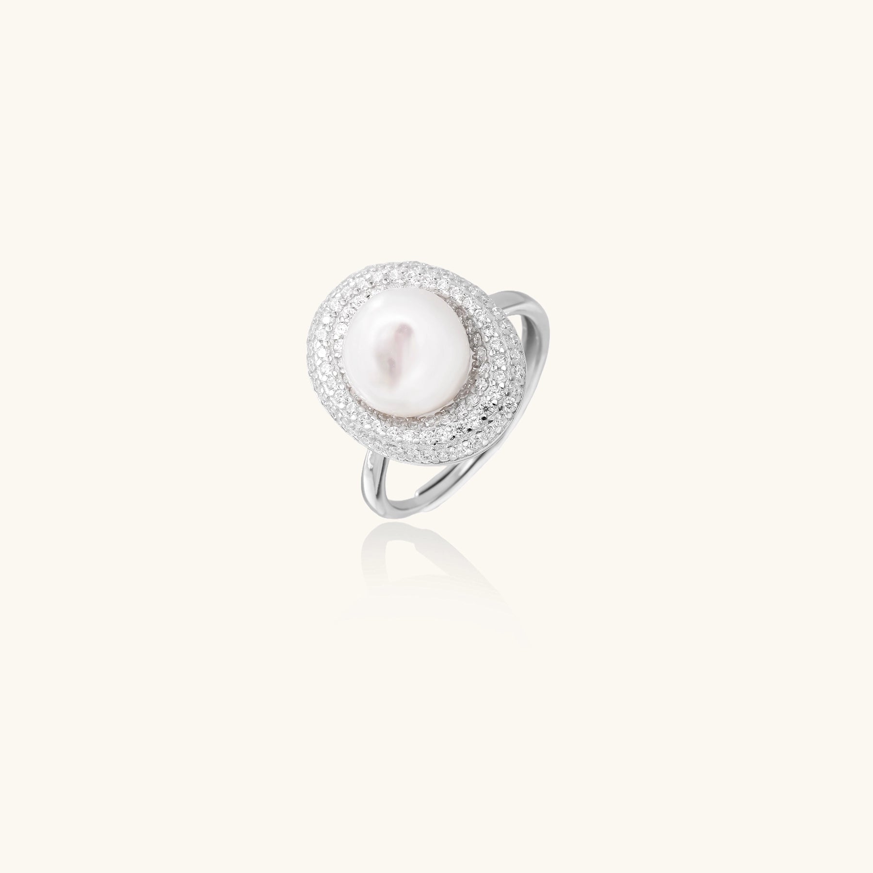 Sterling silver ring with 9mm freshwater pearl center surrounded by double halo of sparkling crystals