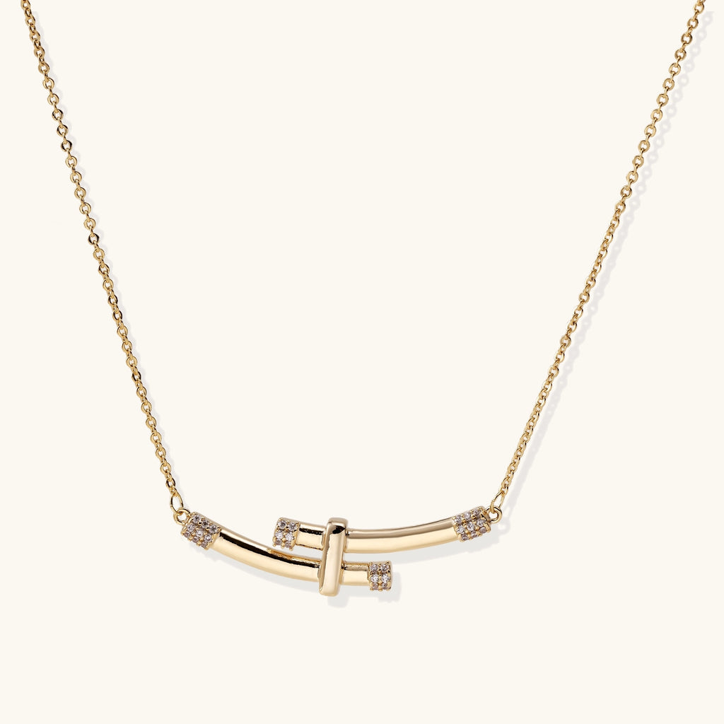 Elegant 14K gold plated necklace featuring two curved bars with diamond accents on adjustable chain