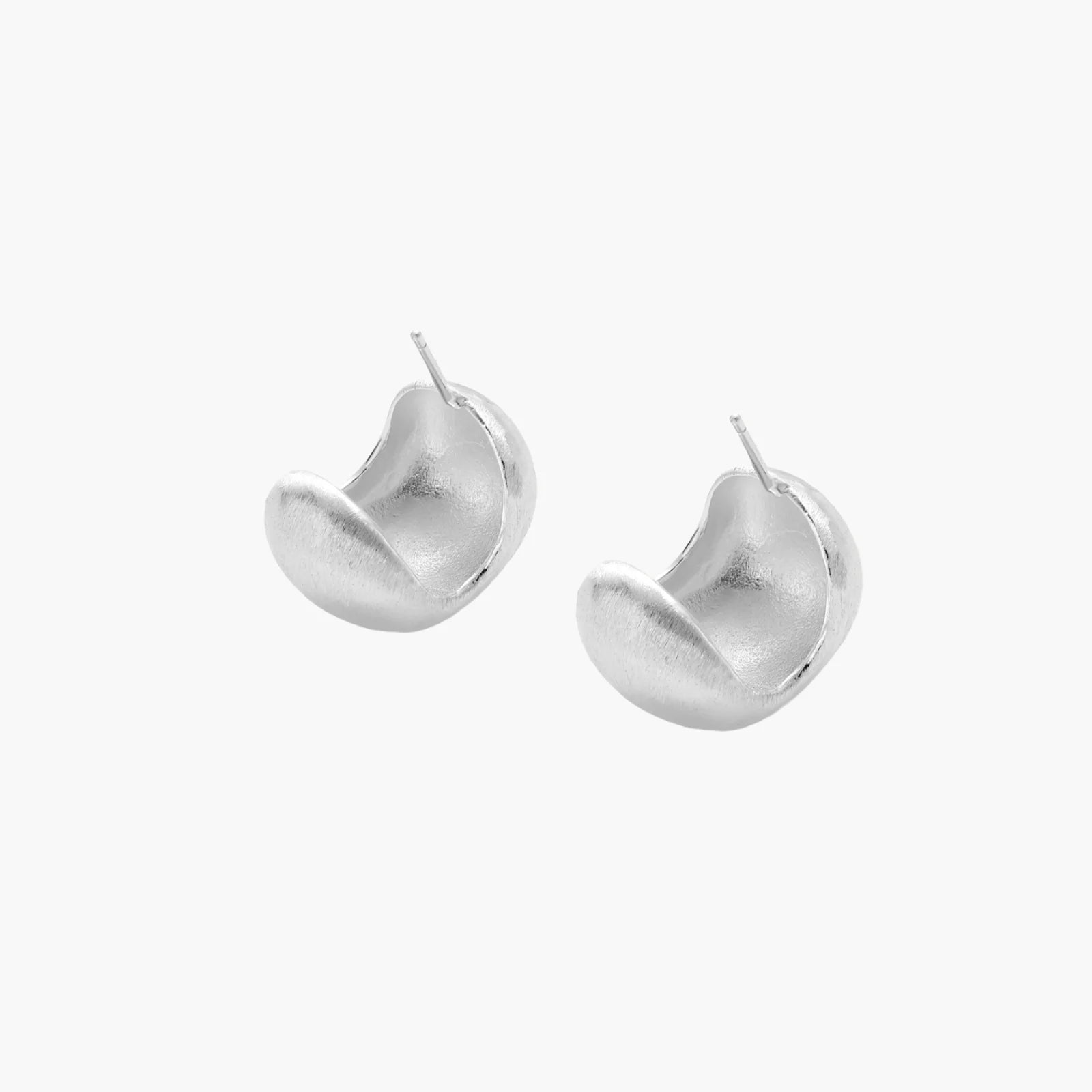 Brushed sterling silver cushion-shaped stud earrings with matte finish on white background