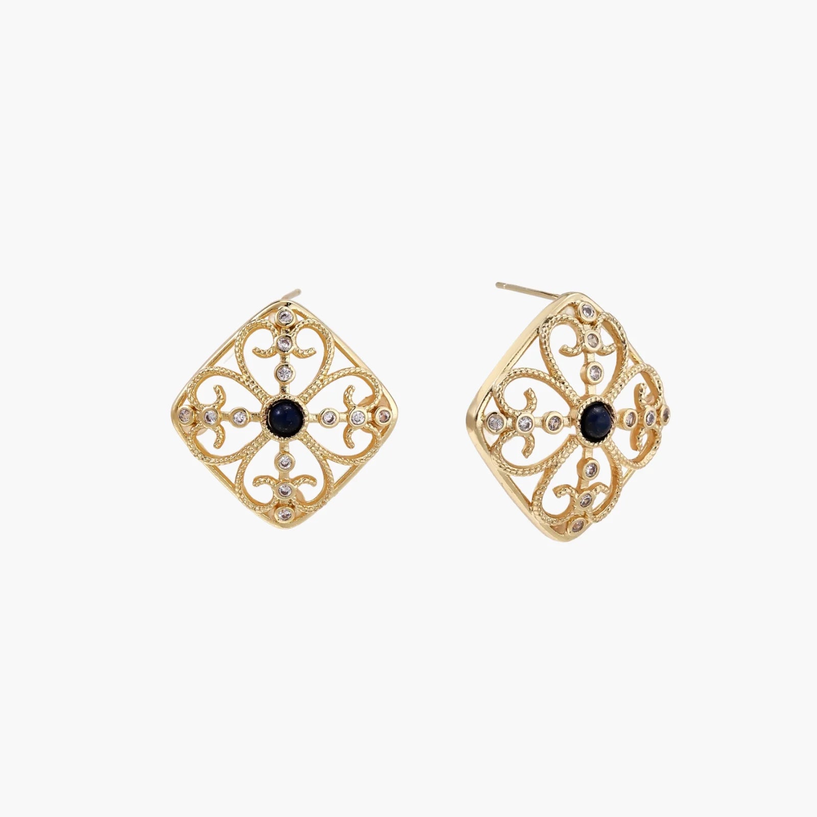 Gold filigree stud earrings with navy lapis lazuli center stone and mother-of-pearl accents in ornate quatrefoil design